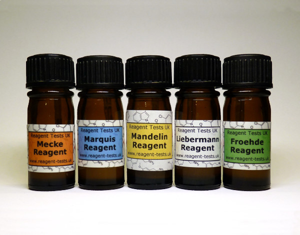 Small medical bottles that contain drug testing reagent testing.